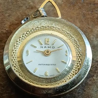 Wooden box with a clock in globe and contents of wood box - Elk pins, Jewelry 14k pendant, and more