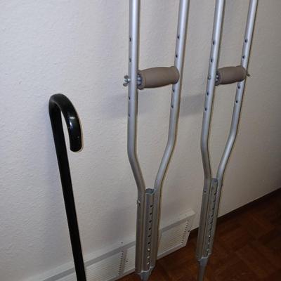 Adjustable crutches 5'2" - 5'10" and a walking cane