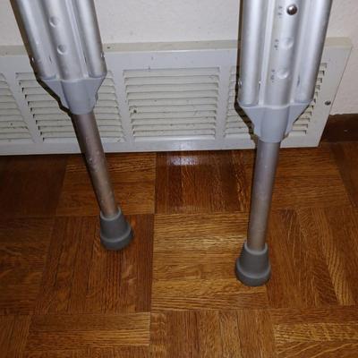 Adjustable crutches 5'2" - 5'10" and a walking cane