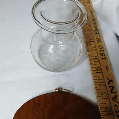 Three wooden wall hanging candle sconces with glass globes