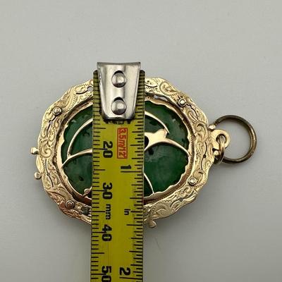 Carved Jade and 14k Gold Pendant