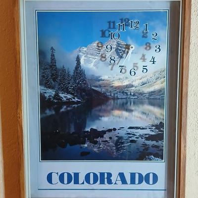Two vintage framed Silhouette wall clocks