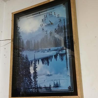Two vintage framed Silhouette wall clocks