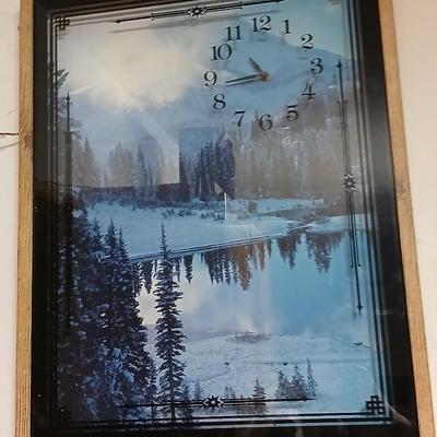 Two vintage framed Silhouette wall clocks