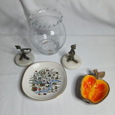 Two pewter clowns on marble bases with apple dish and small plate