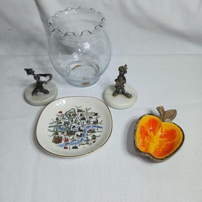 Two pewter clowns on marble bases with apple dish and small plate