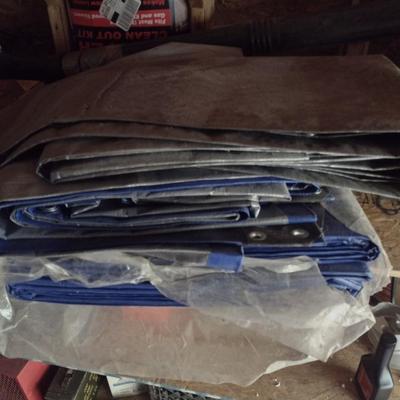 Assortment of New and Used Tarps Various Sizes