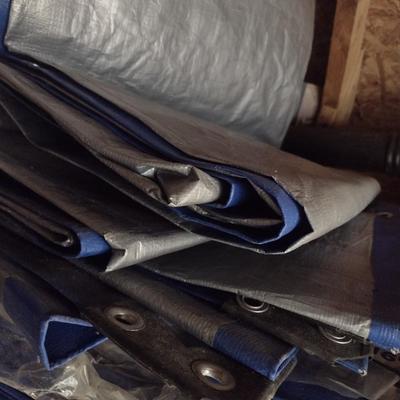 Assortment of New and Used Tarps Various Sizes