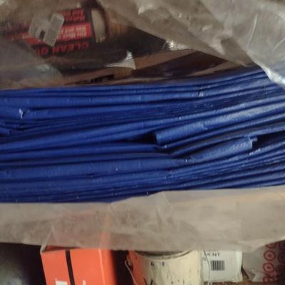 Assortment of New and Used Tarps Various Sizes
