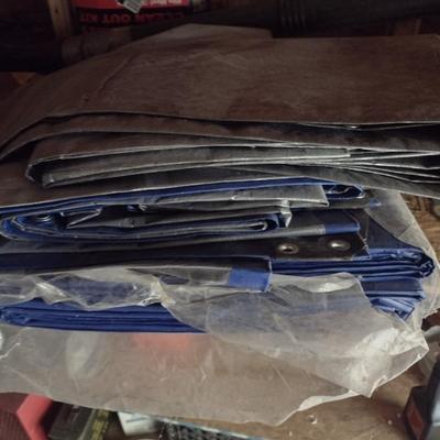 Assortment of New and Used Tarps Various Sizes