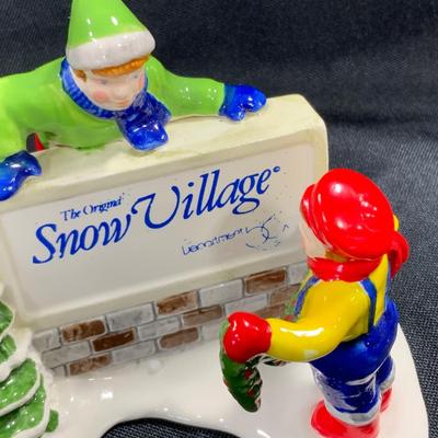 Lot 1 | Kids Decorating the Village Sign