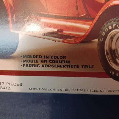 UNASSEMBLED MODEL AND 2 TONKA METAL TRAILERS