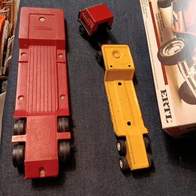 UNASSEMBLED MODEL AND 2 TONKA METAL TRAILERS
