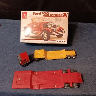 UNASSEMBLED MODEL AND 2 TONKA METAL TRAILERS