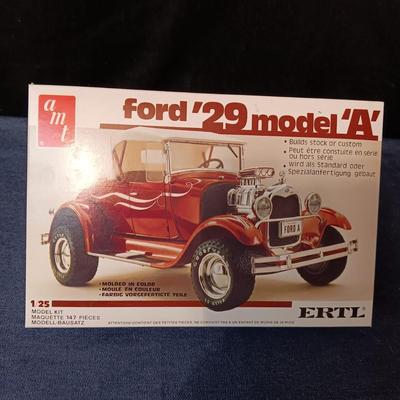 UNASSEMBLED MODEL AND 2 TONKA METAL TRAILERS