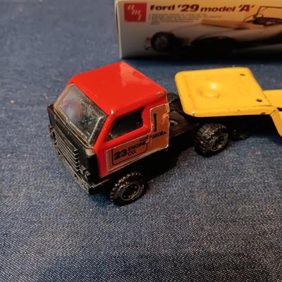 UNASSEMBLED MODEL AND 2 TONKA METAL TRAILERS