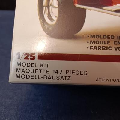 UNASSEMBLED MODEL AND 2 TONKA METAL TRAILERS