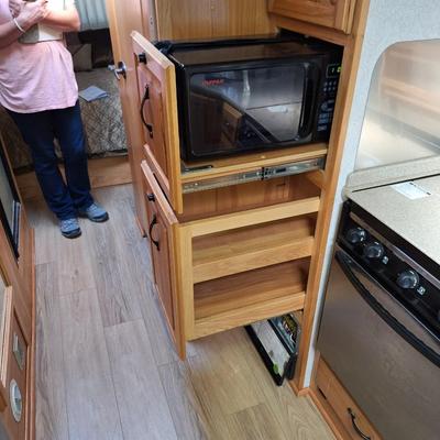 Sale Photo Thumbnail #146: Cedar lined closet, has all manuals, Frig is electric or propane run, 10 CD player, multiple awnings, seperate shower and bathroom areas- needs work on thermostat communication controls and leaky sewer valves