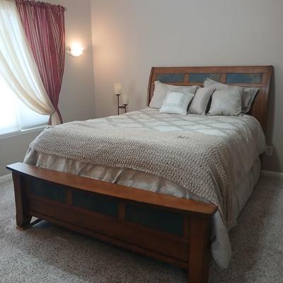 Queen size bed with slate inlayed headboard and footboard includes Denver Serta Mattress & Boxspring