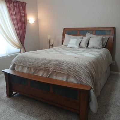 Queen size bed with slate inlayed headboard and footboard includes Denver Serta Mattress & Boxspring