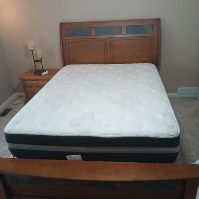 Queen size bed with slate inlayed headboard and footboard includes Denver Serta Mattress & Boxspring