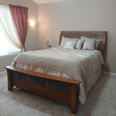 Queen size bed with slate inlayed headboard and footboard includes Denver Serta Mattress & Boxspring