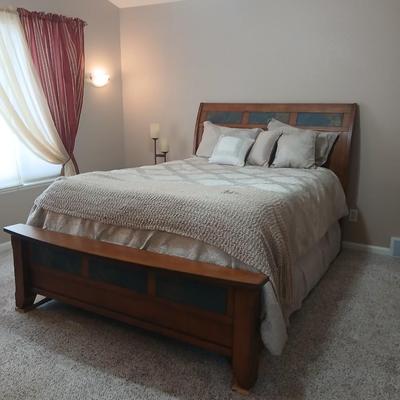 Queen size bed with slate inlayed headboard and footboard includes Denver Serta Mattress & Boxspring