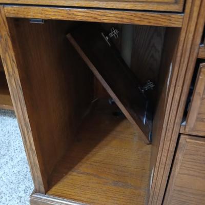 Golden Oak Desk with top hutch with two drawer keys and an office chair