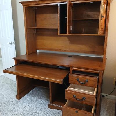 Golden Oak Desk with top hutch with two drawer keys and an office chair