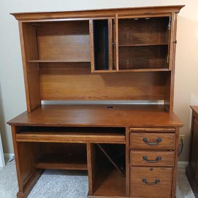 Golden Oak Desk with top hutch with two drawer keys and an office chair