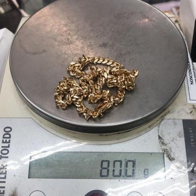 14 k Gold Cuban link chain 24 in