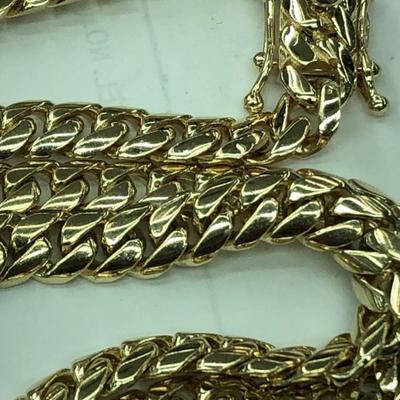 14 k Gold Cuban link chain 24 in