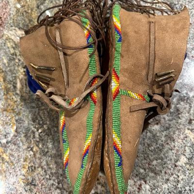 Sale Photo Thumbnail #1010: Large pair of Native American beaded mocassins vintage from a collector. Unfortunately, there is no provenance.