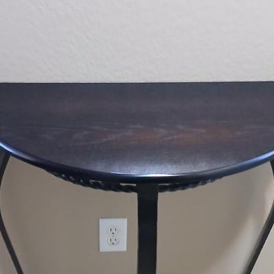 Half-moon wooden topped wrought iron framed entry table