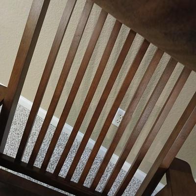 Glider rocking chair with chocolate brown removable cushions