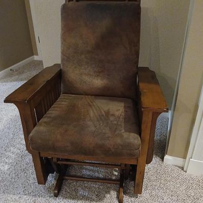 Glider rocking chair with chocolate brown removable cushions