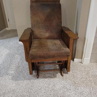 Glider rocking chair with chocolate brown removable cushions