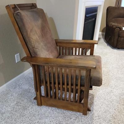 Glider rocking chair with chocolate brown removable cushions