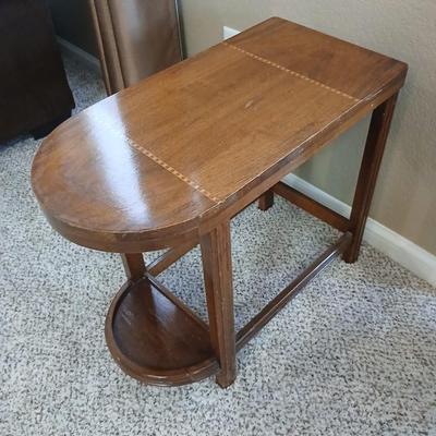 Small half oval end table with inlayed wood top design
