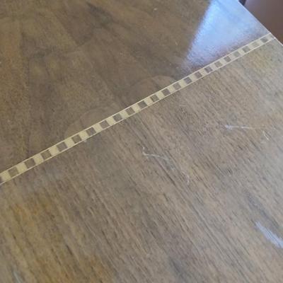 Small half oval end table with inlayed wood top design