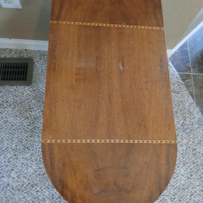 Small half oval end table with inlayed wood top design
