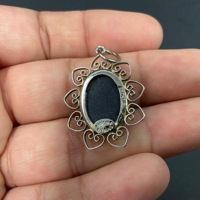 -44- FINE JEWELRY | Sterling Pendants & Brooch