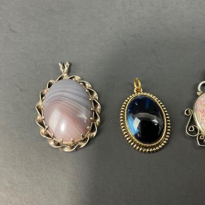 -44- FINE JEWELRY | Sterling Pendants & Brooch