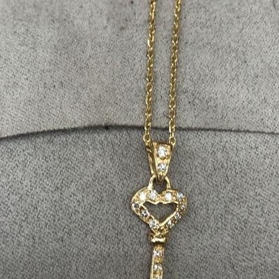 14 k Gold diamonds necklace 22 in