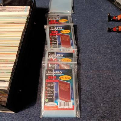 BOX OF SPORT TRADING CARDS AND CARD SLEEVES