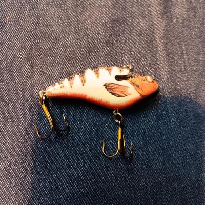 FISHING LURES AND A DOUBLE COMPARTMENT PLANO ORGANIZER