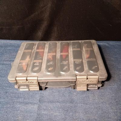 FISHING LURES AND A DOUBLE COMPARTMENT PLANO ORGANIZER