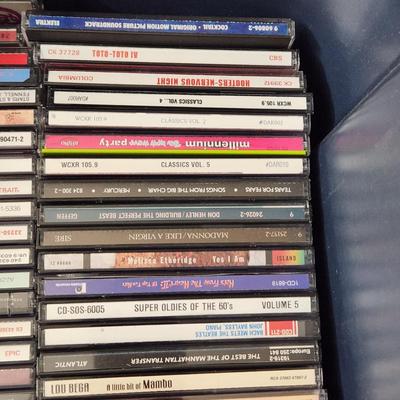 Lot of Music CDs includes tote Jimmy Buffett, Fleetwood Mac, Jimi Hendrix, Eagles, ZZ Top ,Rock Artifacts