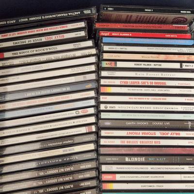 Lot of Music CDs includes tote Jimmy Buffett, Fleetwood Mac, Jimi Hendrix, Eagles, ZZ Top ,Rock Artifacts