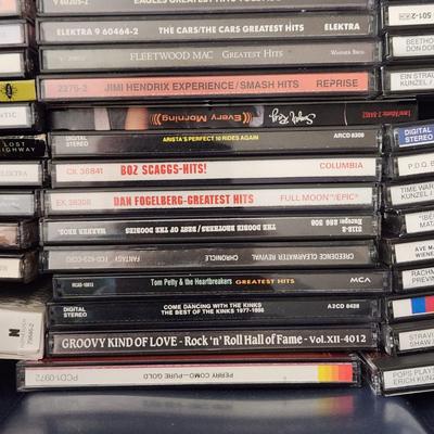 Lot of Music CDs includes tote Jimmy Buffett, Fleetwood Mac, Jimi Hendrix, Eagles, ZZ Top ,Rock Artifacts
